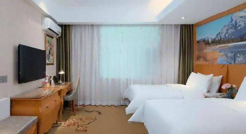 Bed in Vienna Hotel Qinghai Xining Wanda Plaza