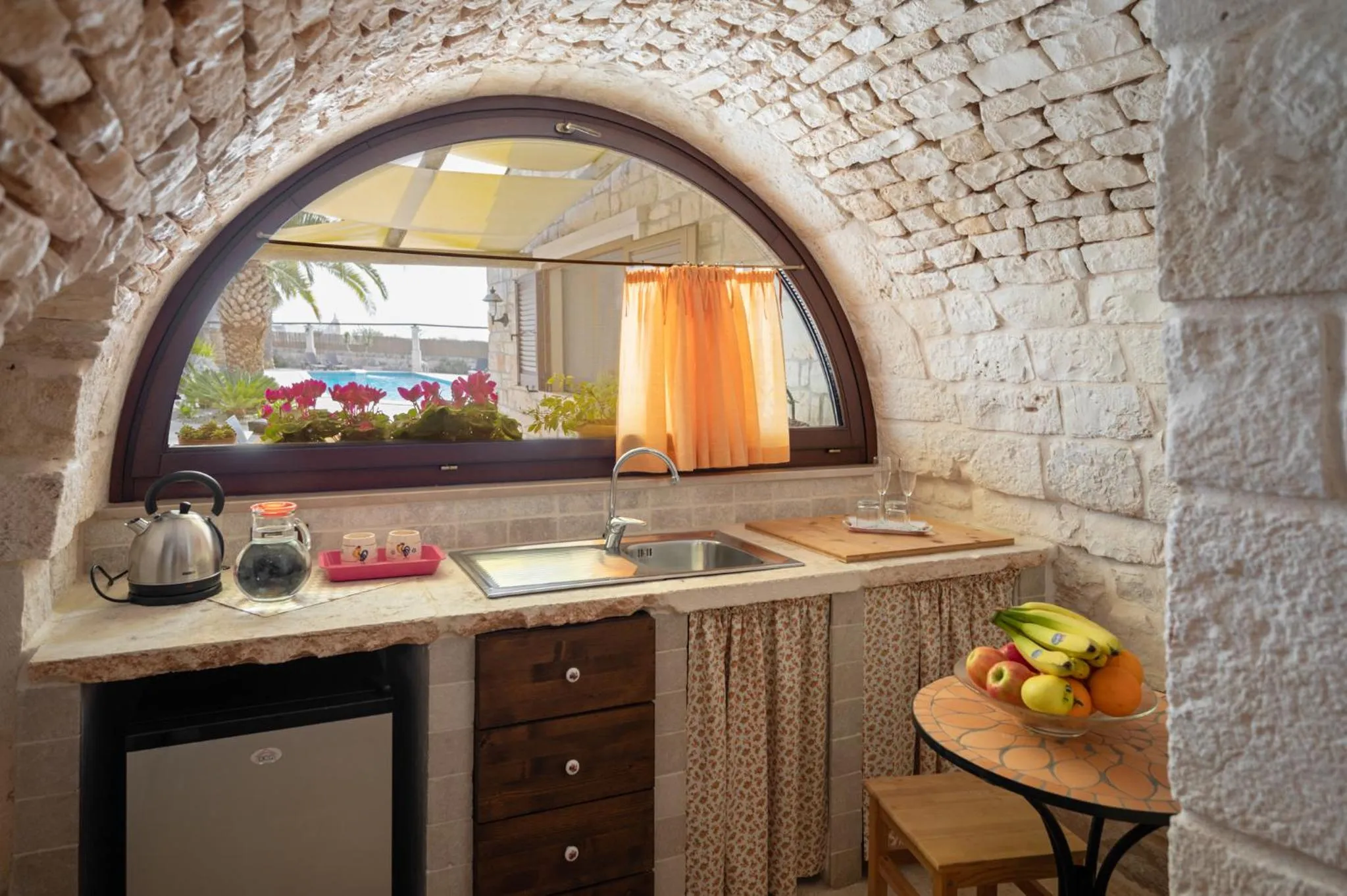 Kitchen or kitchenette in Trulli D'autore