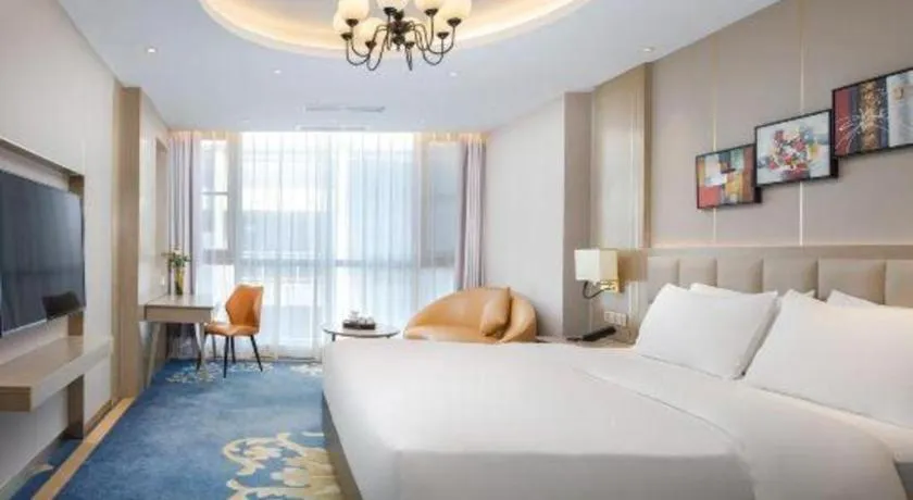 Bed in Vienna Hotel Yunnan Maitreya Huquan