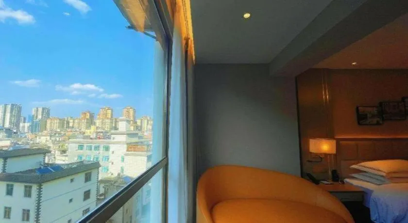 Bed in Vienna Hotel Yunnan Maitreya Huquan