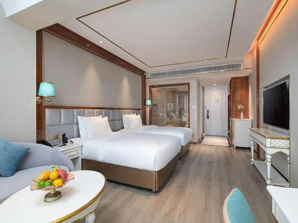 Bed in Vienna Hotel Yunnan Maitreya Huquan