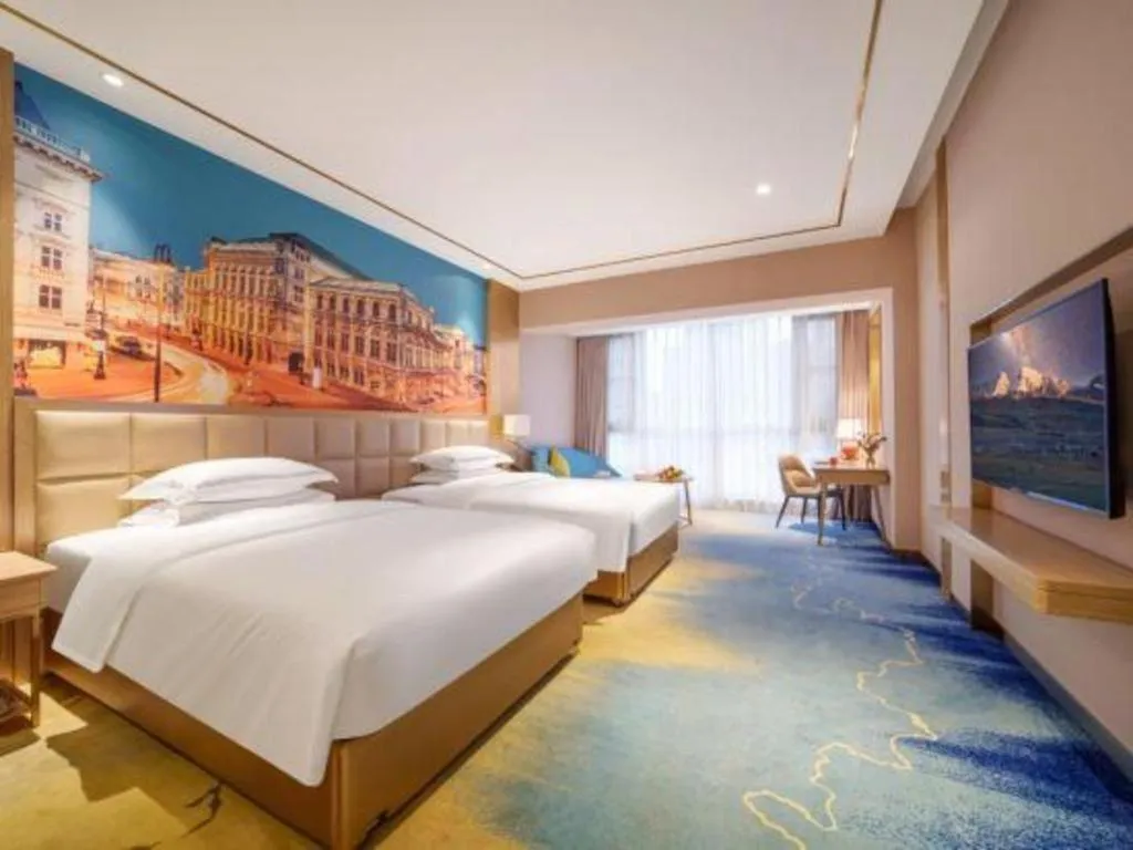 Bed in Vienna Hotel Yunnan Maitreya Huquan