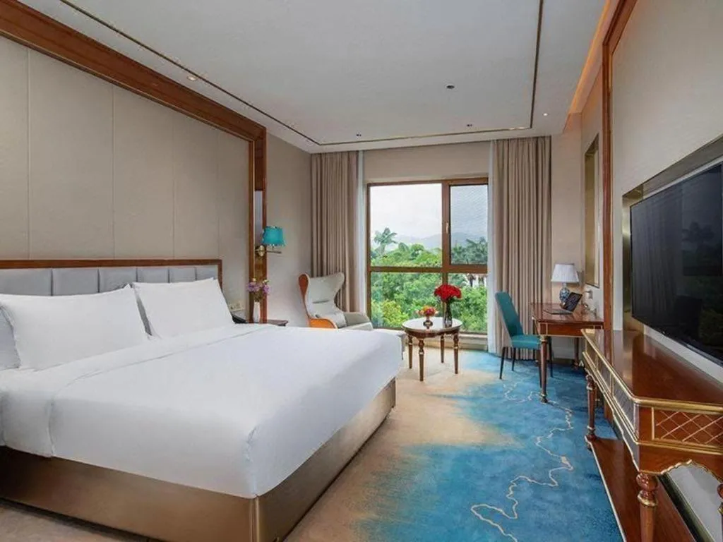 Bed in Vienna Hotel Yunnan Maitreya Huquan