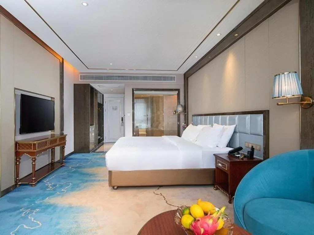 Bed in Vienna Hotel Yunnan Maitreya Huquan