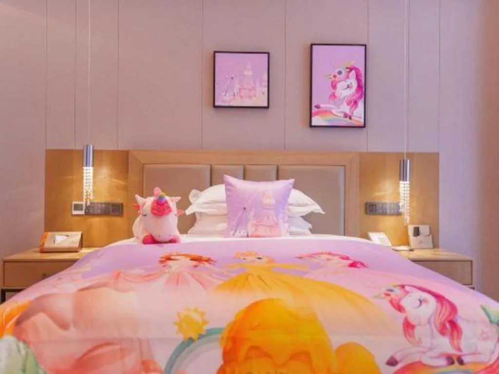 Bed in Vienna Hotel Yunnan Maitreya Huquan