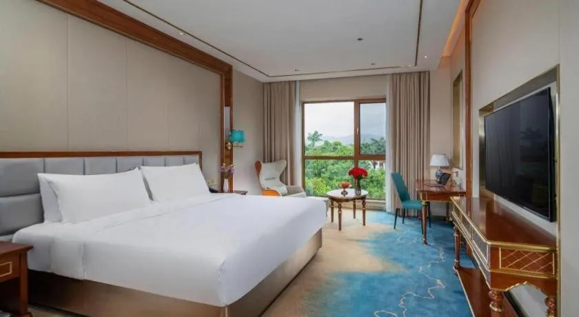 Bed in Vienna Hotel Yunnan Maitreya Huquan