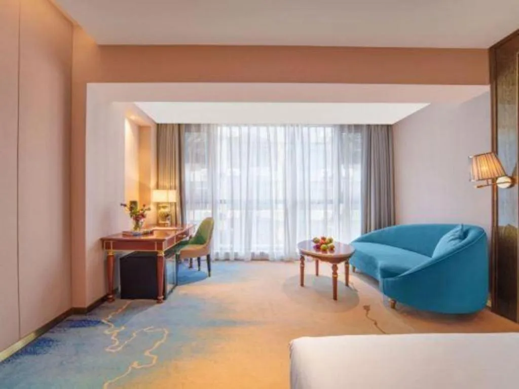 Bed in Vienna Hotel Yunnan Maitreya Huquan