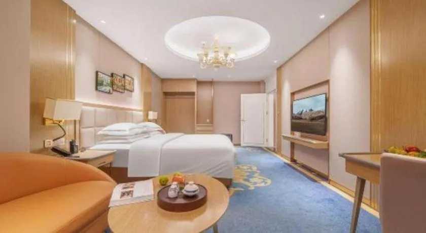 Bed in Vienna Hotel Yunnan Maitreya Huquan