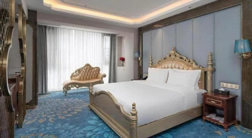 Bed in Vienna Hotel Yunnan Maitreya Huquan