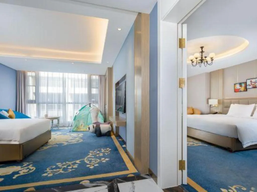 Bed in Vienna Hotel Yunnan Maitreya Huquan