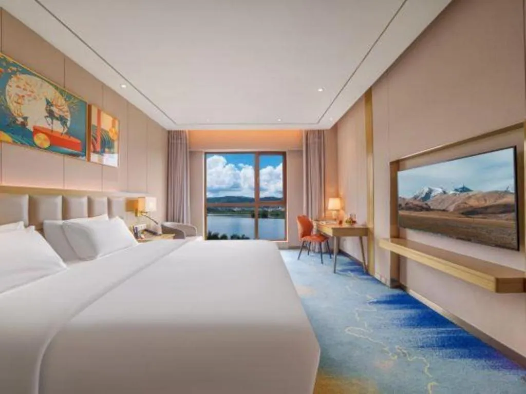 Bed in Vienna Hotel Yunnan Maitreya Huquan