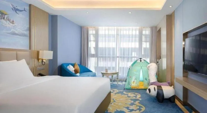 Bed in Vienna Hotel Yunnan Maitreya Huquan