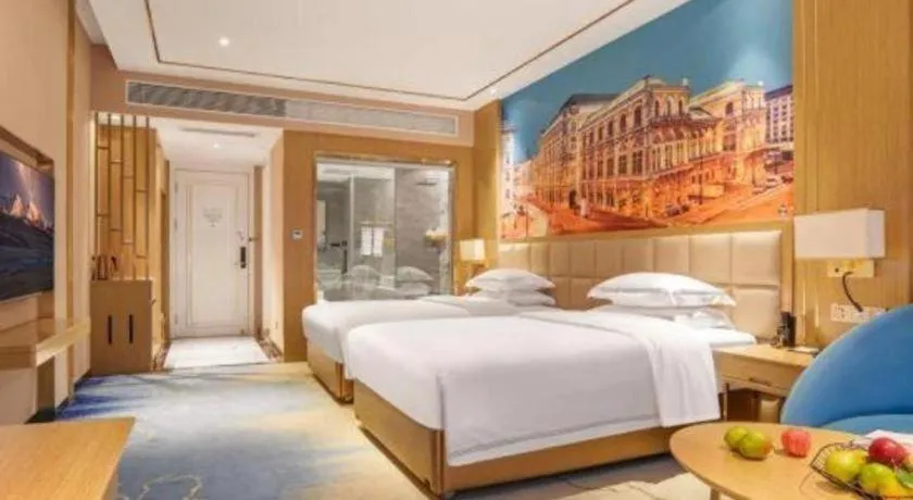 Bed in Vienna Hotel Yunnan Maitreya Huquan