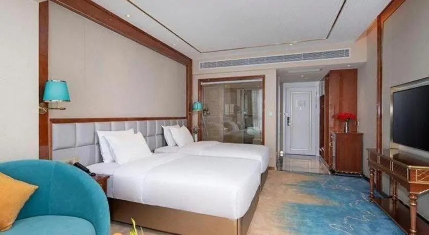 Bed in Vienna Hotel Yunnan Maitreya Huquan