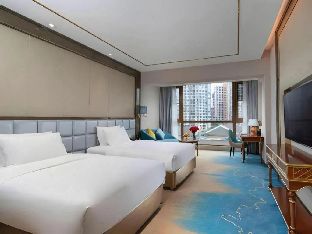 Bed in Vienna Hotel Yunnan Maitreya Huquan