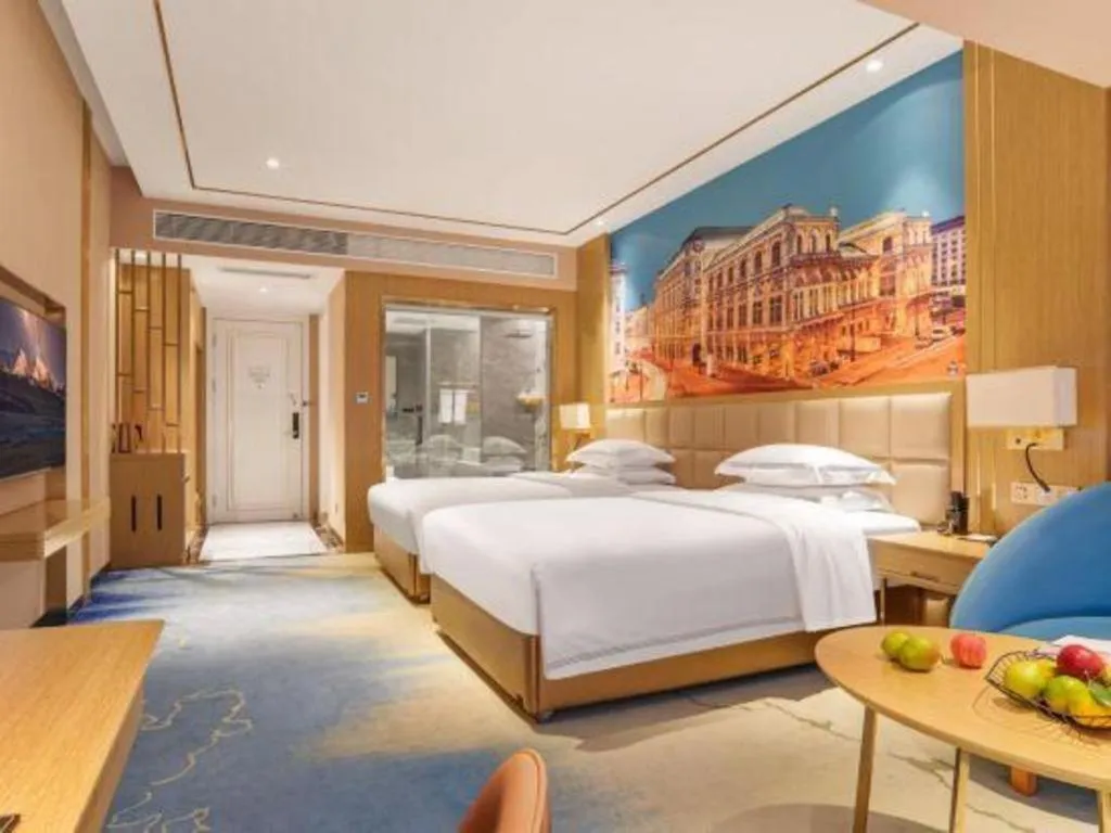Bed in Vienna Hotel Yunnan Maitreya Huquan
