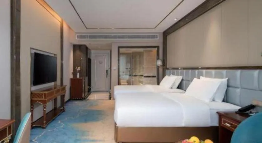 Bed in Vienna Hotel Yunnan Maitreya Huquan