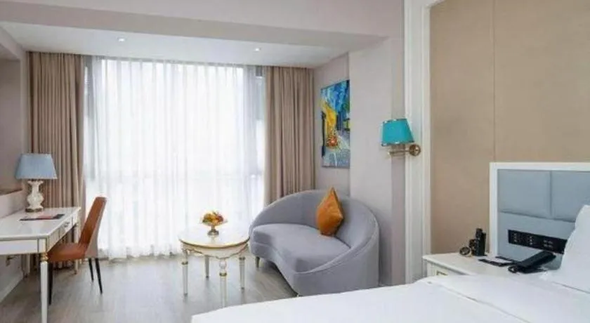 Bed in Vienna Hotel Yunnan Maitreya Huquan