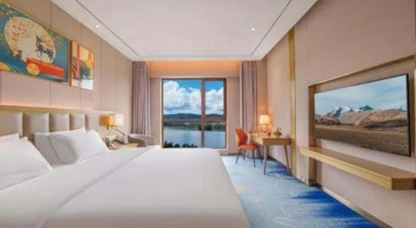 Bed in Vienna Hotel Yunnan Maitreya Huquan