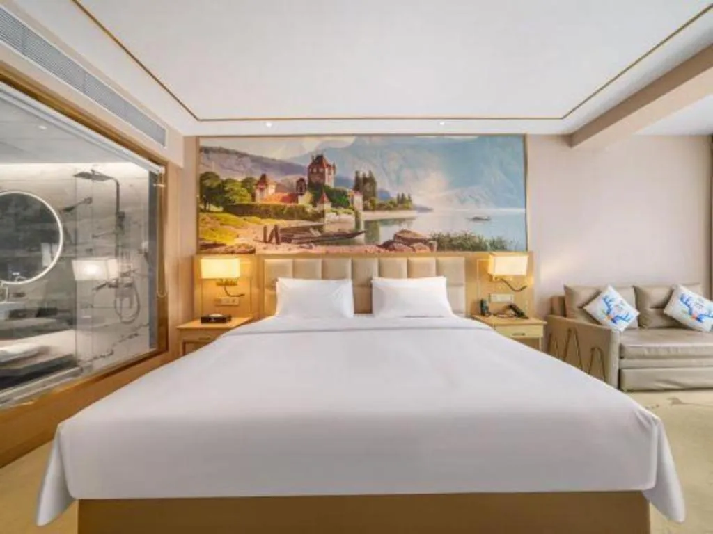 Bed in Vienna Hotel Yunnan Maitreya Huquan