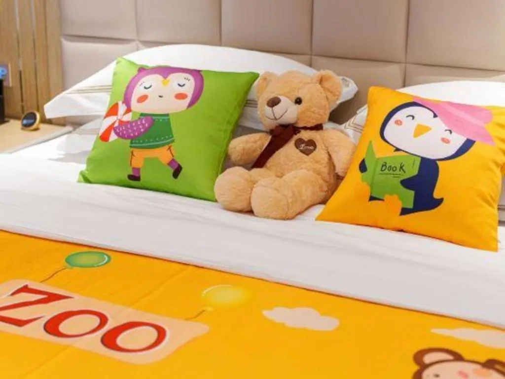 Bed in Vienna Hotel Yunnan Maitreya Huquan