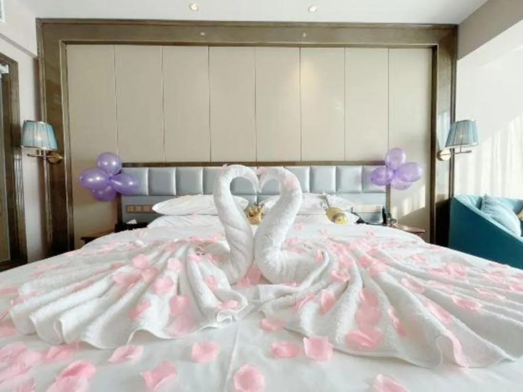 Bed in Vienna Hotel Yunnan Maitreya Huquan