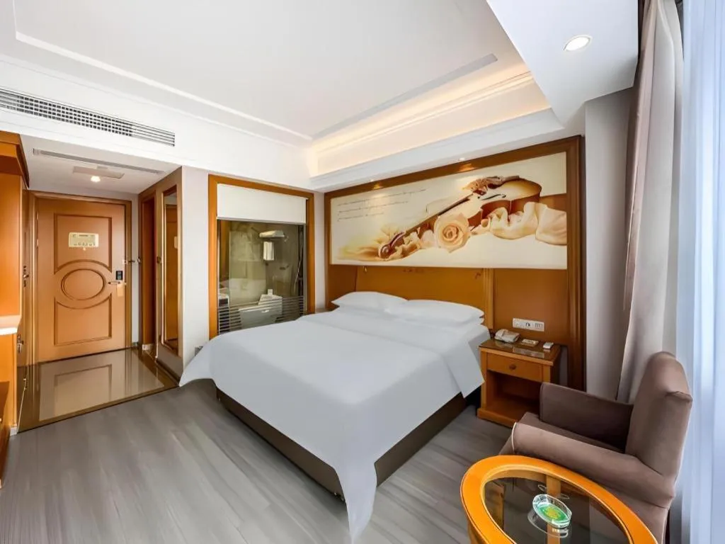 Bed in Vienna Hotel Anhui Xuancheng High-Speed Railway Station