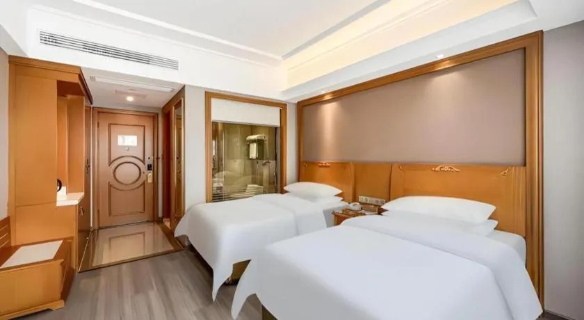 Bed in Vienna Hotel Anhui Xuancheng High-Speed Railway Station