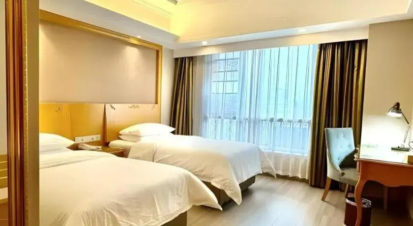Bed in Vienna Hotel Anhui Xuancheng High-Speed Railway Station Bed in Vienna Hotel Anhui Xuancheng High-Speed Railway Station