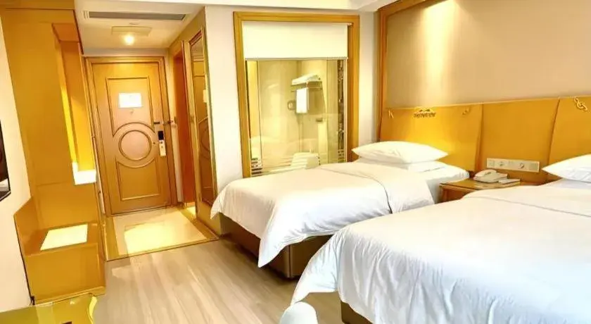 Bed in Vienna Hotel Anhui Xuancheng High-Speed Railway Station Bed in Vienna Hotel Anhui Xuancheng High-Speed Railway Station