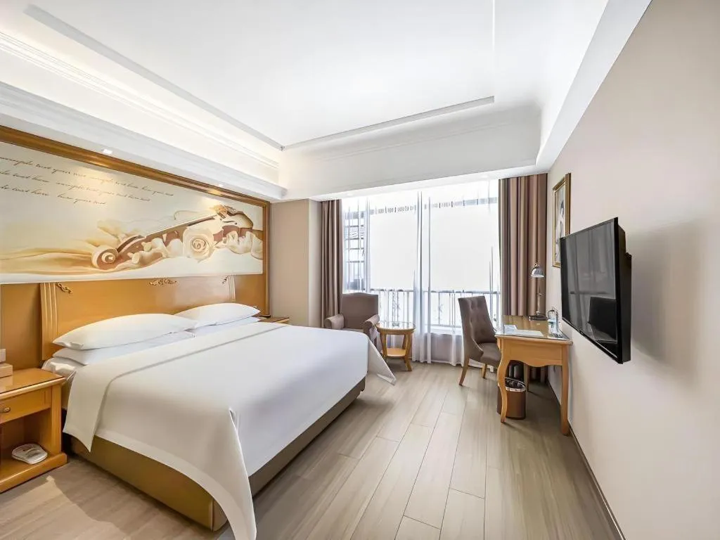 Bed in Vienna Hotel Anhui Xuancheng High-Speed Railway Station