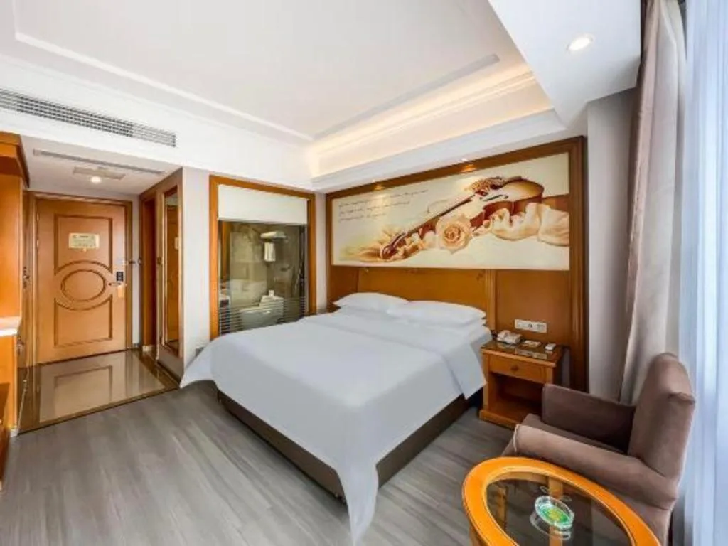 Bed in Vienna Hotel Anhui Xuancheng High-Speed Railway Station