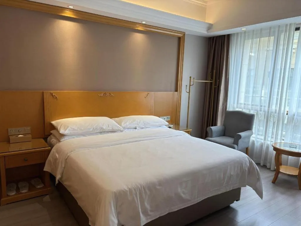 Bed in Vienna Hotel Anhui Xuancheng High-Speed Railway Station