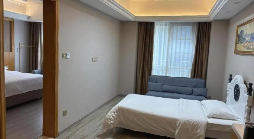 Bed in Vienna Hotel Anhui Xuancheng High-Speed Railway Station