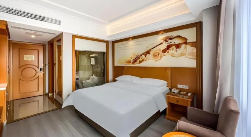 Bed in Vienna Hotel Anhui Xuancheng High-Speed Railway Station
