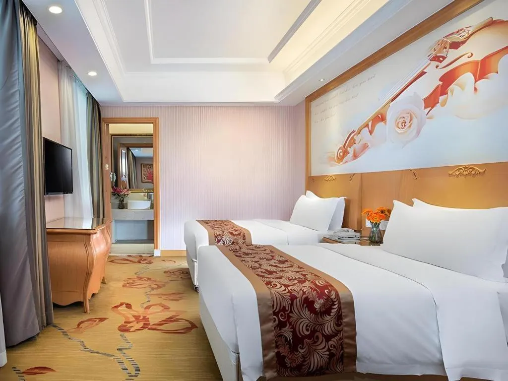 Bed in Vienna Hotel Hubei Macheng Cultural Town