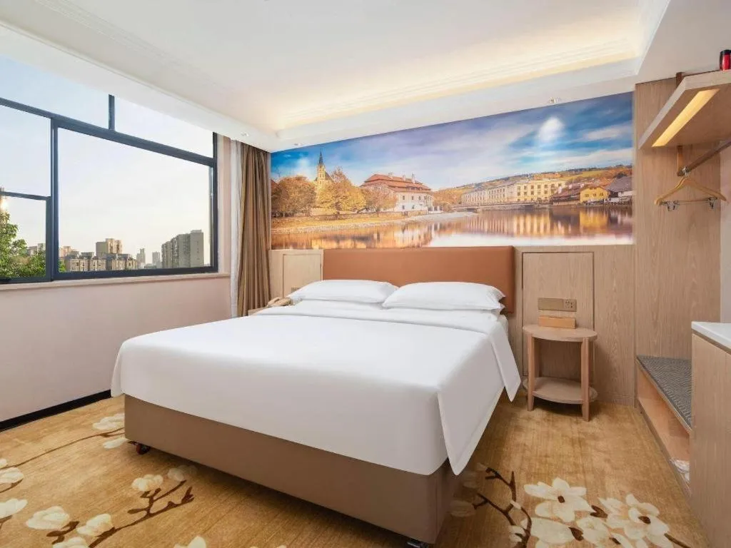 Bed in Vienna Hotel Hubei Macheng Cultural Town