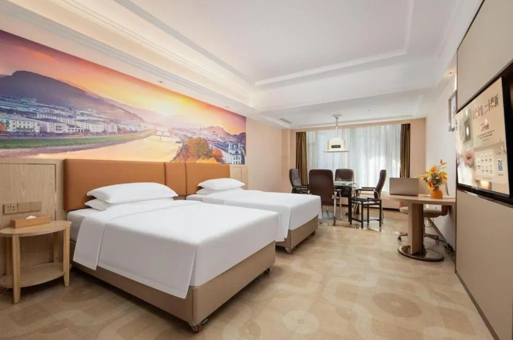 Bed in Vienna Hotel Hubei Macheng Cultural Town