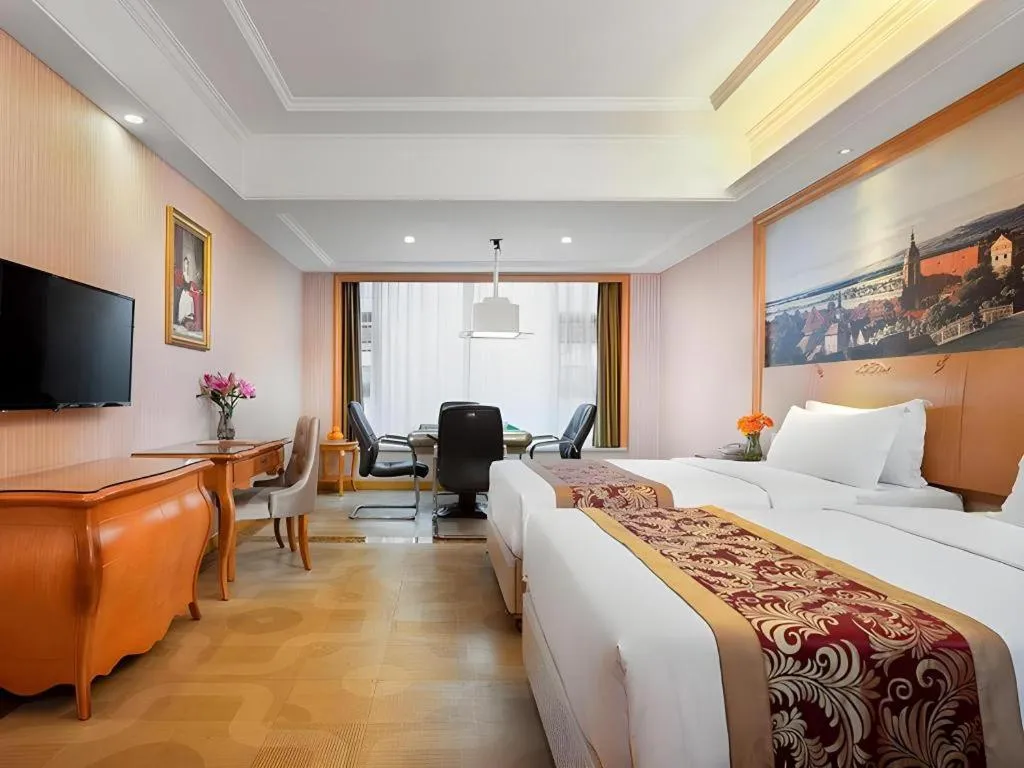 Bed in Vienna Hotel Hubei Macheng Cultural Town