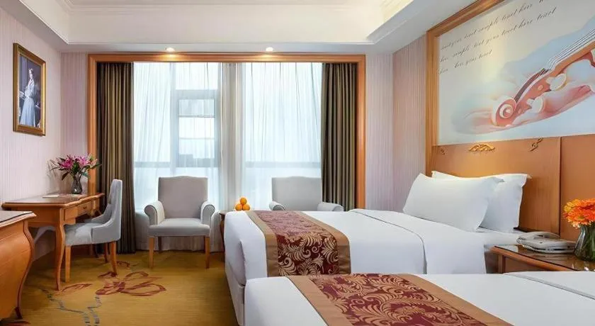 Bed in Vienna Hotel Hubei Macheng Cultural Town