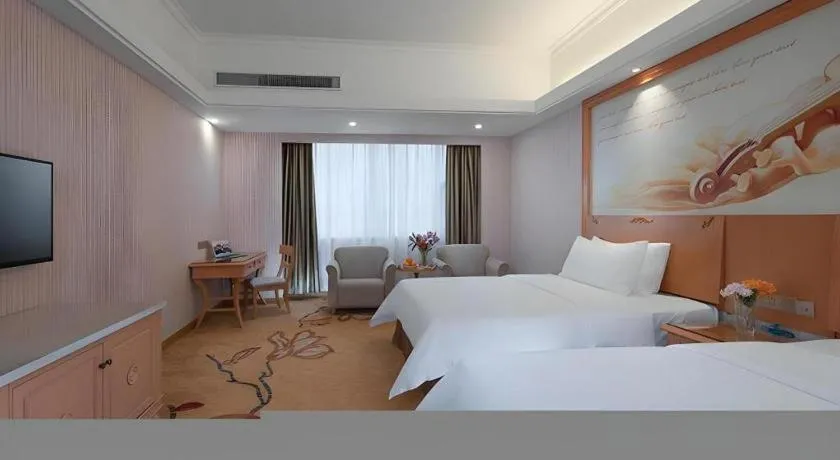 Bed in Vienna Hotel Hubei Macheng Cultural Town