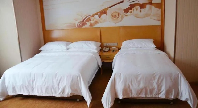 Bed in Vienna Hotel Tianjin 5th Avenue Youyi Road Cultural Center Metro Station