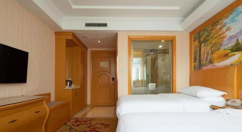 Bed in Vienna Hotel Tianjin 5th Avenue Youyi Road Cultural Center Metro Station