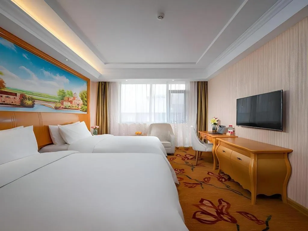 Bed in Vienna Hotel Tianjin 5th Avenue Youyi Road Cultural Center Metro Station
