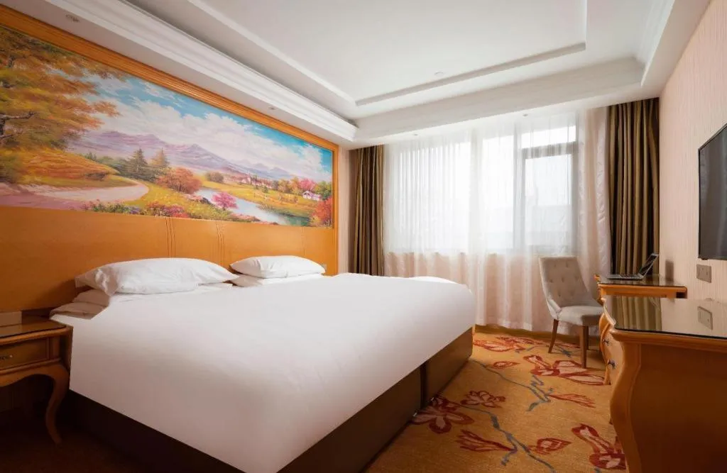 Bed in Vienna Hotel Tianjin 5th Avenue Youyi Road Cultural Center Metro Station