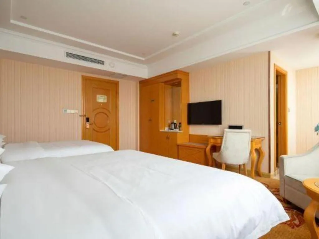 Bed in Vienna Hotel Tianjin 5th Avenue Youyi Road Cultural Center Metro Station