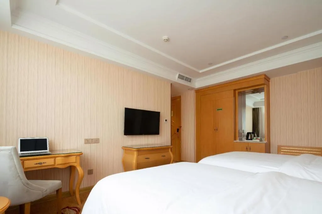 Bed in Vienna Hotel Tianjin 5th Avenue Youyi Road Cultural Center Metro Station