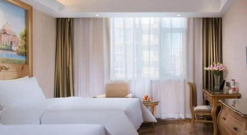 Bed in Vienna Hotel Tianjin 5th Avenue Youyi Road Cultural Center Metro Station