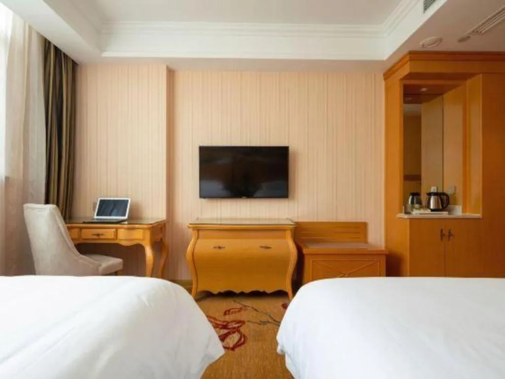 Bed in Vienna Hotel Tianjin 5th Avenue Youyi Road Cultural Center Metro Station