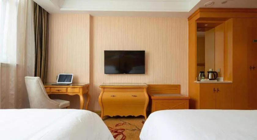 Bed in Vienna Hotel Tianjin 5th Avenue Youyi Road Cultural Center Metro Station